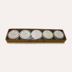 Caixa com 5 velas perfumadas em lata